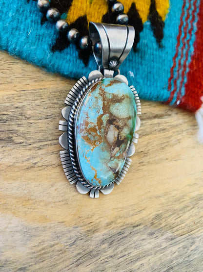 Navajo Royston Turquoise and Sterling Silver Pendant by Russell Sam