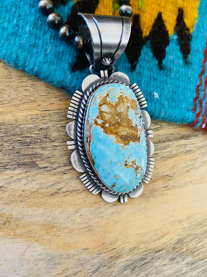 Navajo Royston Turquoise and Sterling Silver Pendant by Russell Sam