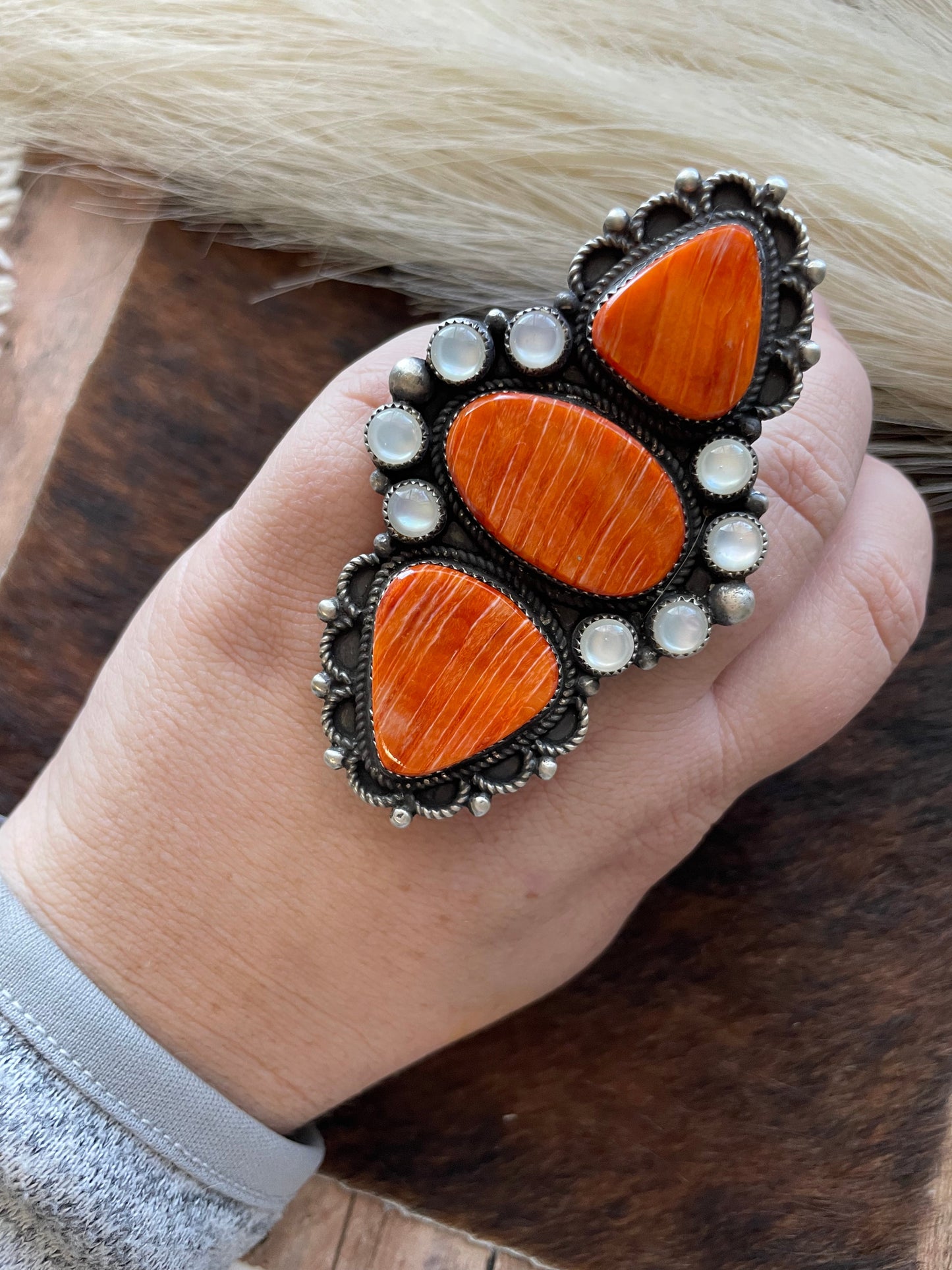 Devon Brown Navajo Sterling, Mother of Pearl Orange Spiny ring adjustable